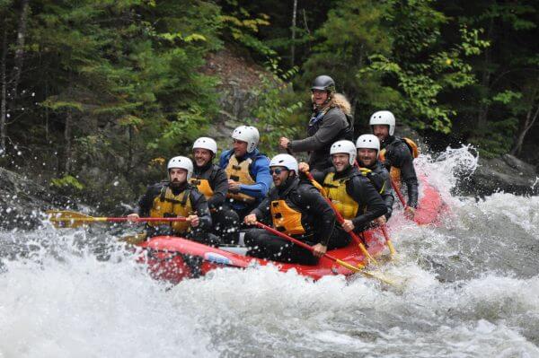 Group of people on a boat Whitewater Rafting