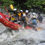 People Whitewater Rafting on the Kennebec