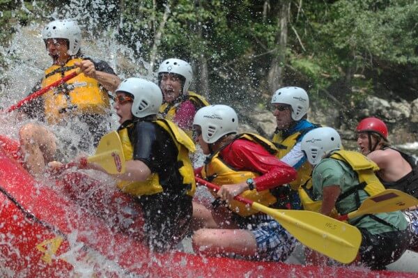 Closeup of People Whitewater Rafting