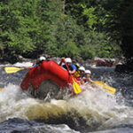 People Whitewater Rafting on the Kennebec River